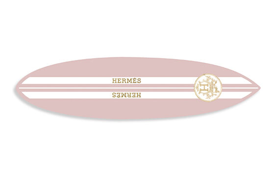 Blush pink surfboard with white stripes and a fashion logo in the middle