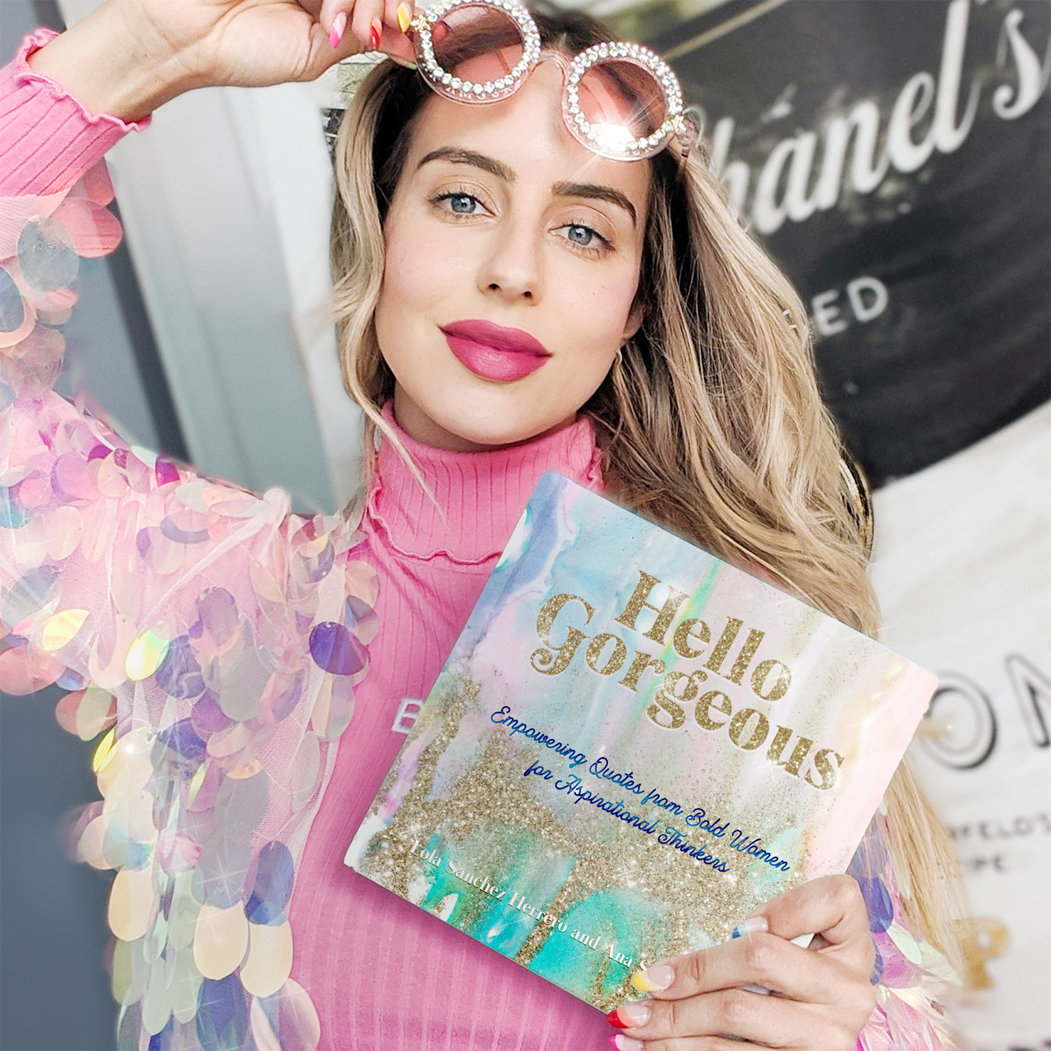 Image of founder and author Lola Sanchez showcasing her new book Hello Gorgeous. 