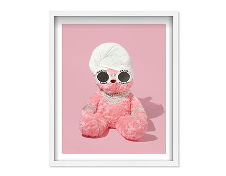 Framed wall art of a fashion teddy bear with sunglasses, jewelry and a towel around its head