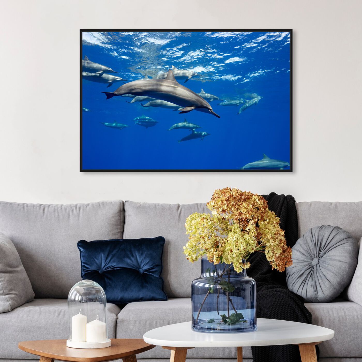 Hanging view of Large Group of Spinner Dolphins by David Fleetham featuring nautical and coastal and marine life art.
