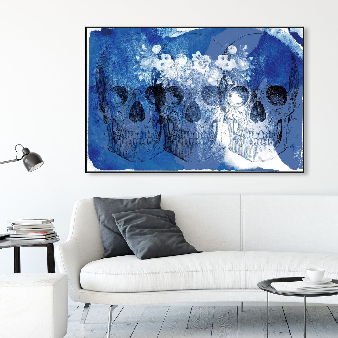 Hanging view of Blue Blossom featuring symbols and objects and skull art.