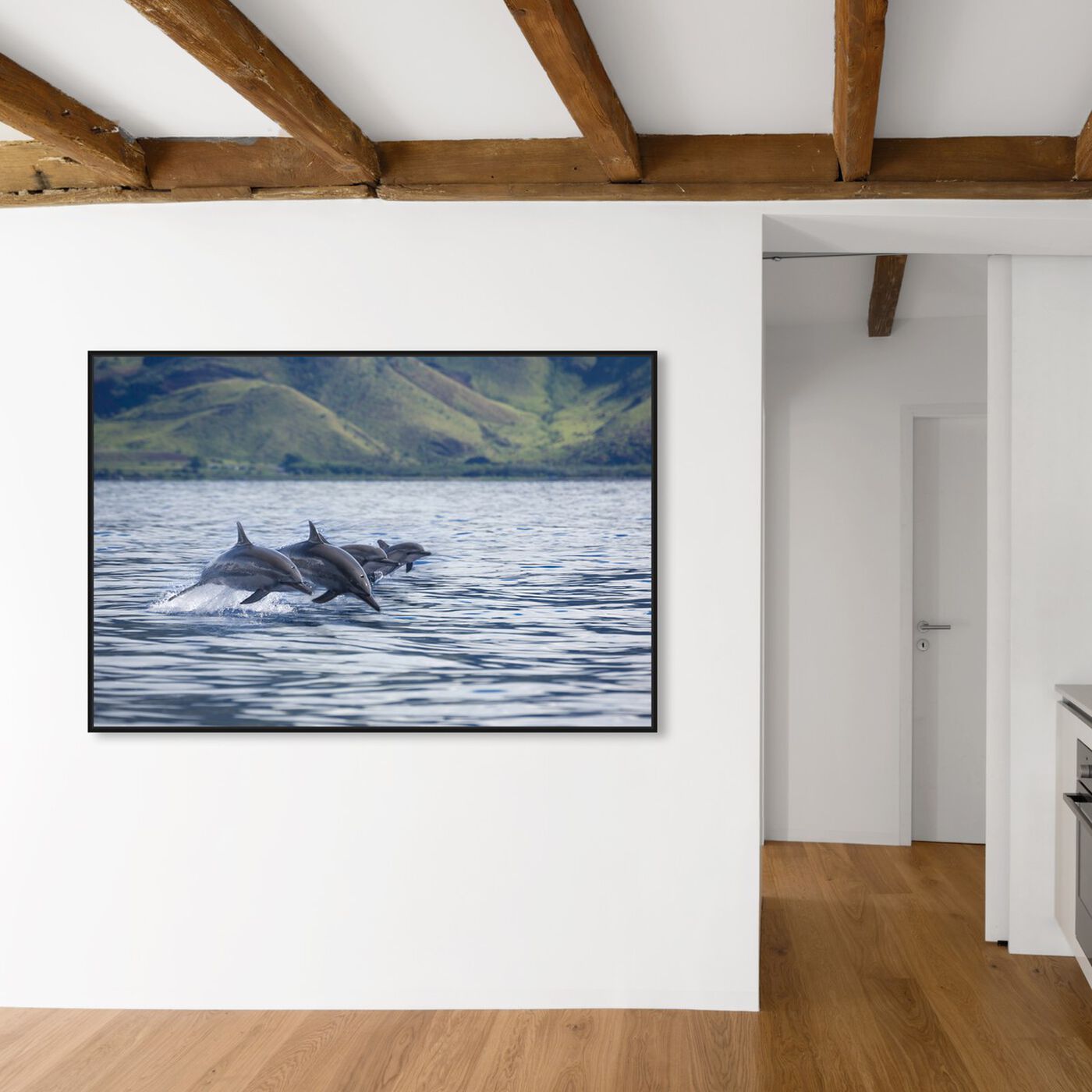 Hanging view of Four Spinner Dolphins by David Fleetham featuring nautical and coastal and marine life art.