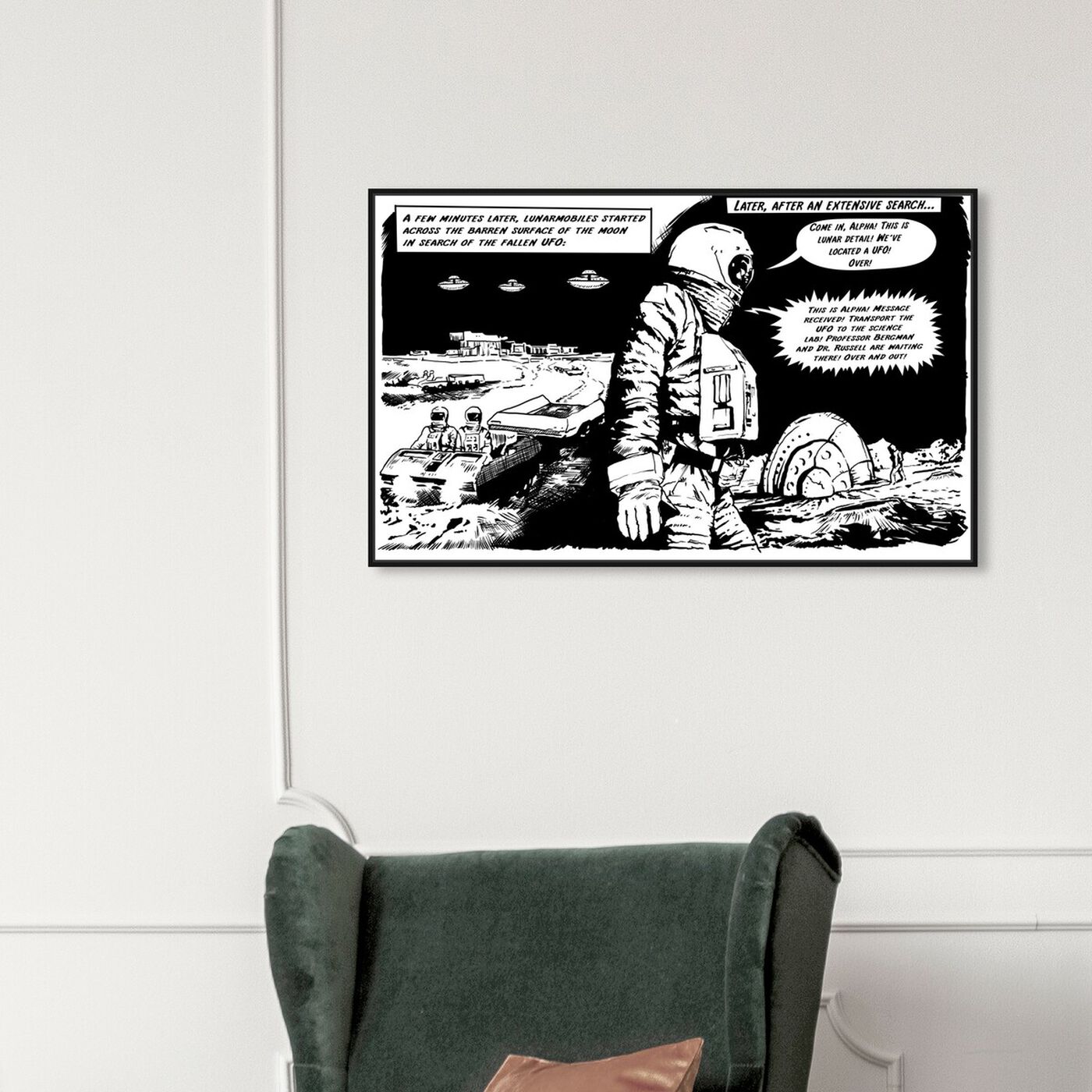 Hanging view of On The Moon featuring advertising and comics art.