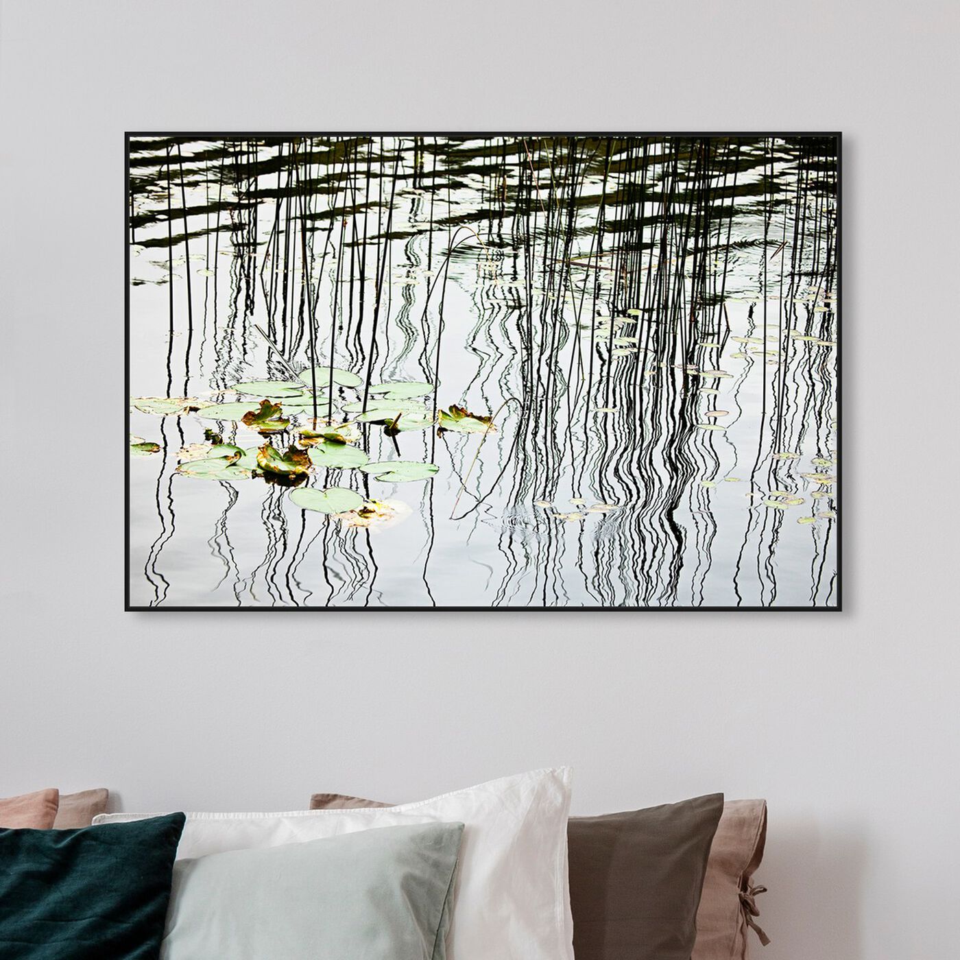 Hanging view of Lily Pads and Reflections on a Lake by David Fleetham featuring nature and landscape and nature art.