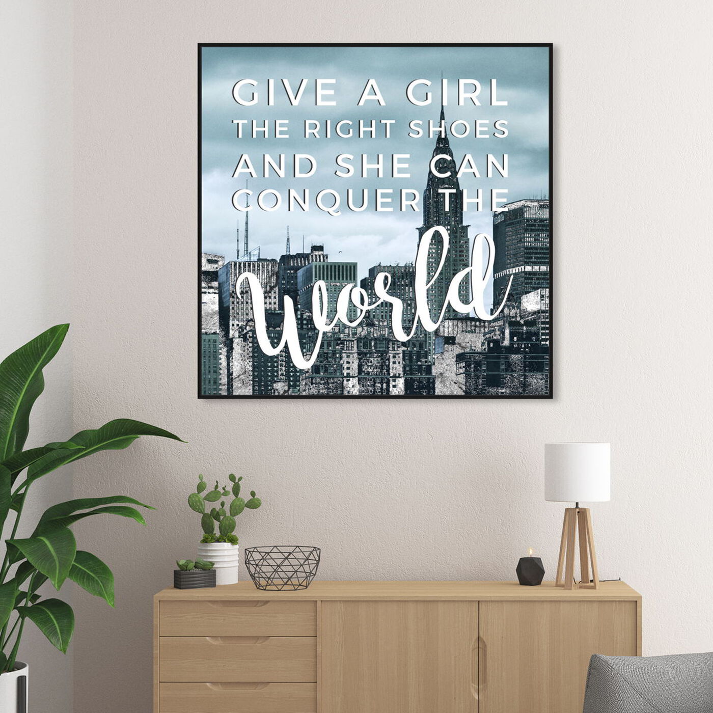Hanging view of Conquer featuring typography and quotes and empowered women quotes and sayings art.