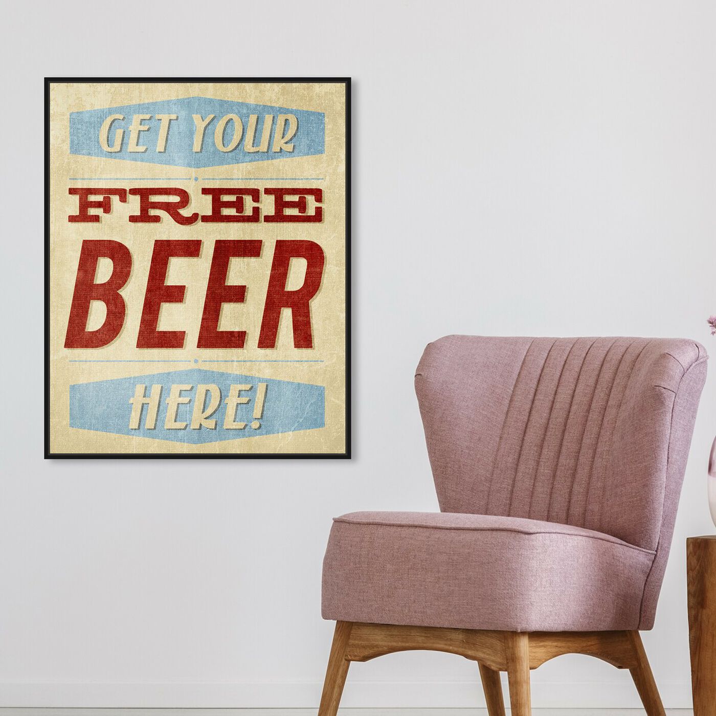Hanging view of Free Beer Here featuring advertising and promotional brands art.