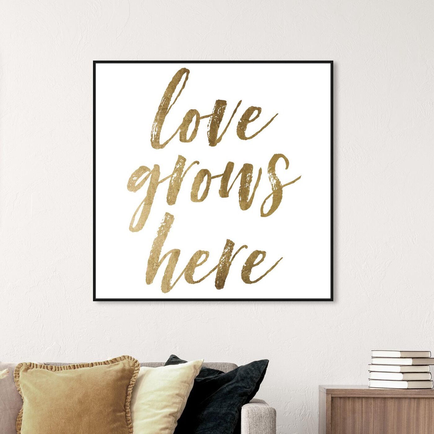 Hanging view of Love Grows Here Gold featuring typography and quotes and love quotes and sayings art.